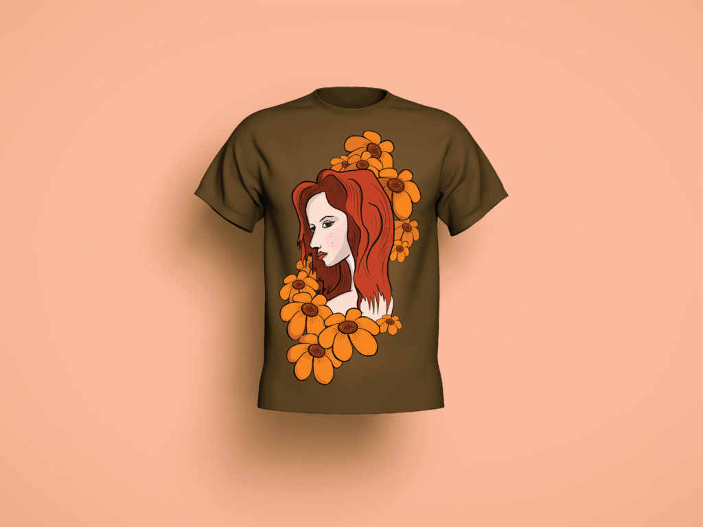 Image of t-shirt with a print of a red haired woman surrounded by daisies in a cartoon, graffiti stylee.